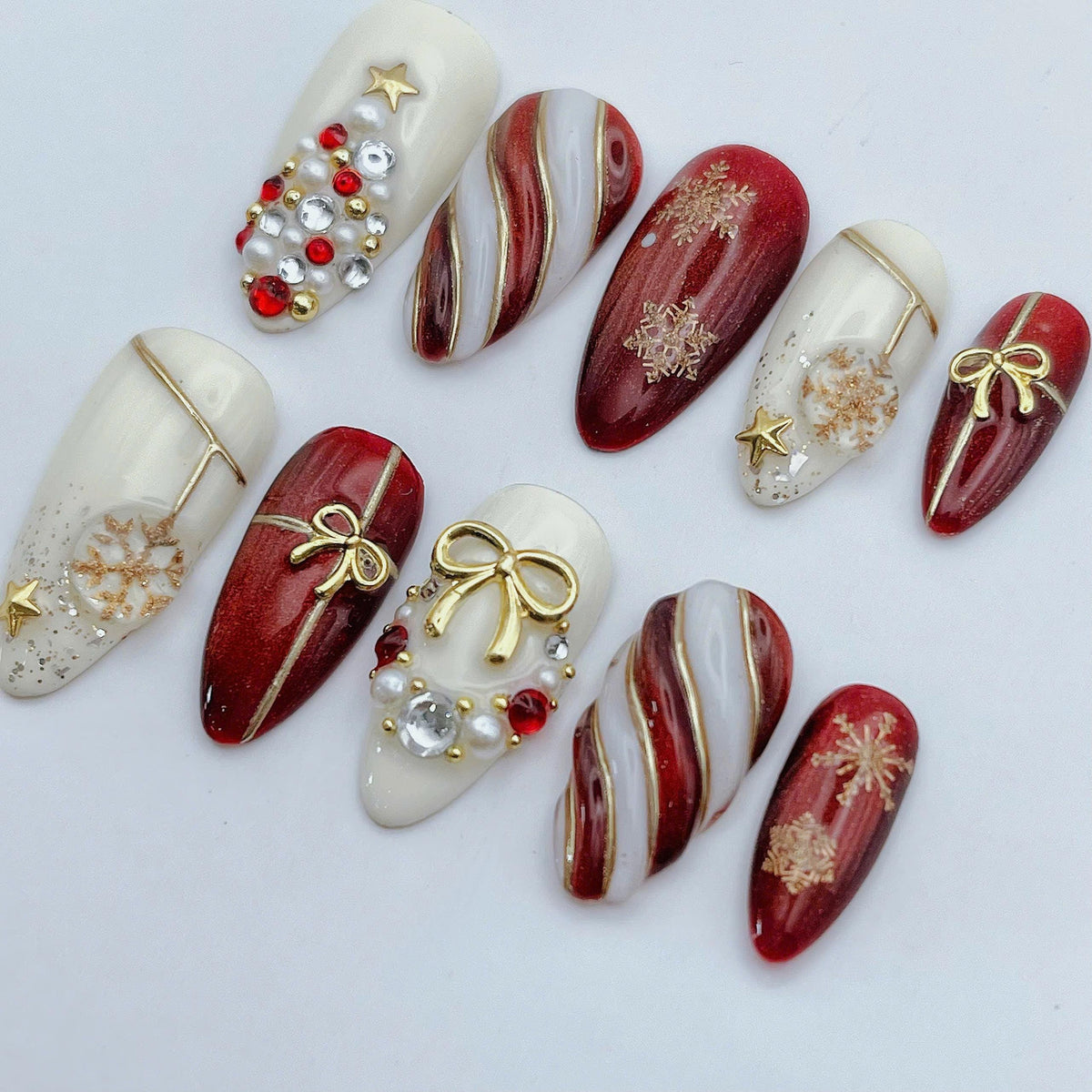 Red, Ivory & Gold Christmas Nails with Bows, Snowflakes and Rhinestones