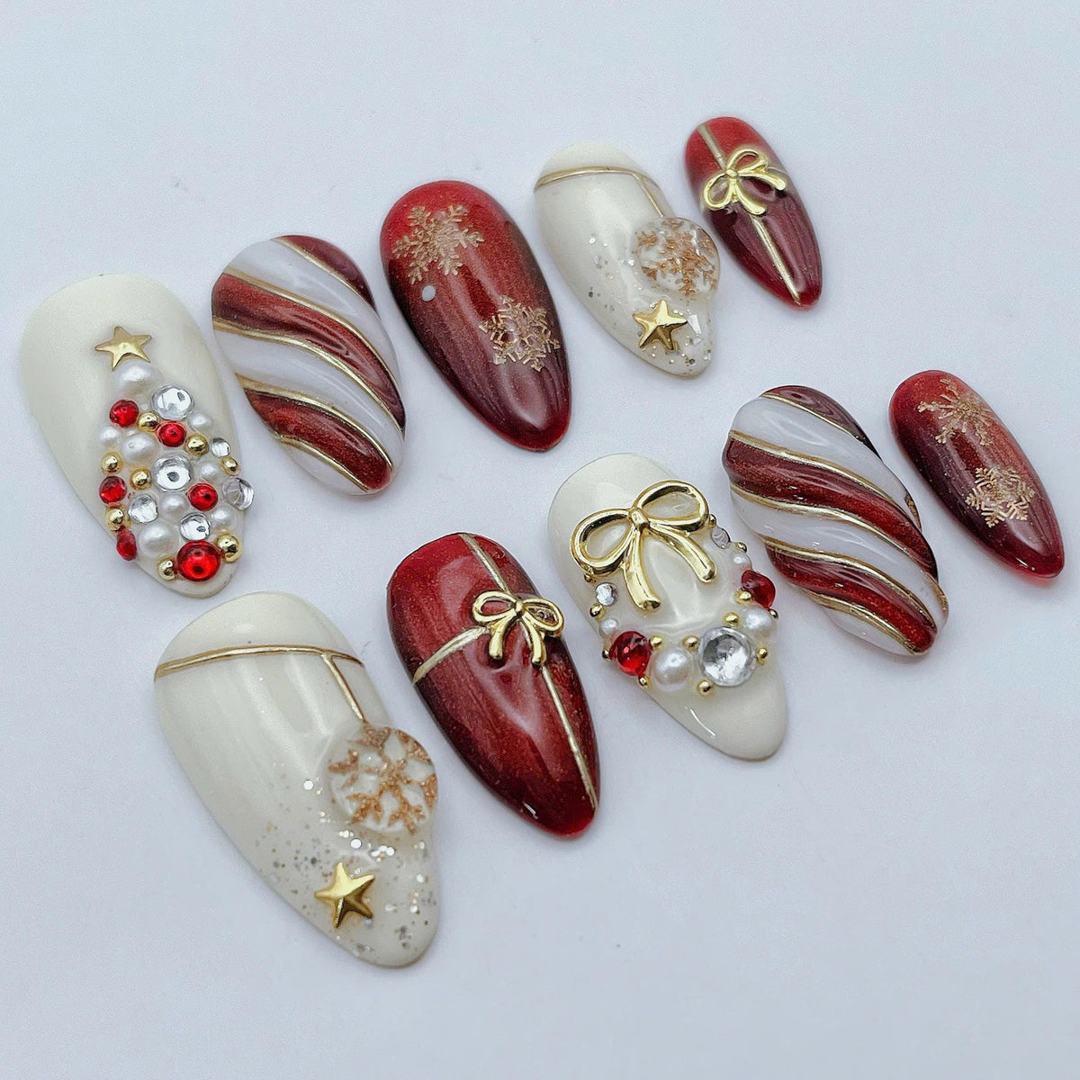 Red, Ivory & Gold Christmas Nails with Bows, Snowflakes and Rhinestones