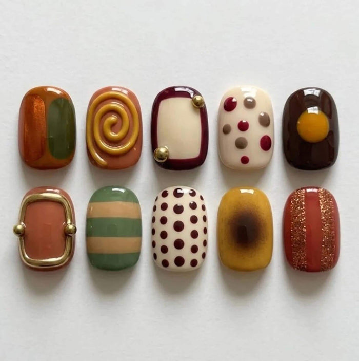 Retro 70s Press On Nails With Mustard Spirals, Earthy Stripes and Gold-Tone Accents