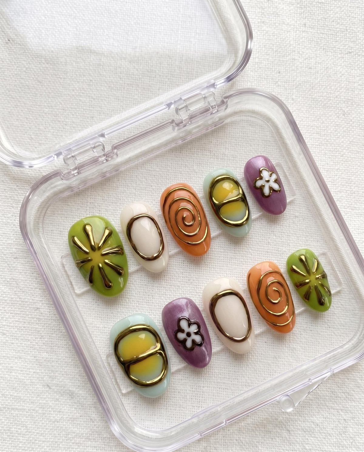 Retro Y2K Floral and Abstract Nail Set in Lavender, Lime, Orange, and Pastel Colors