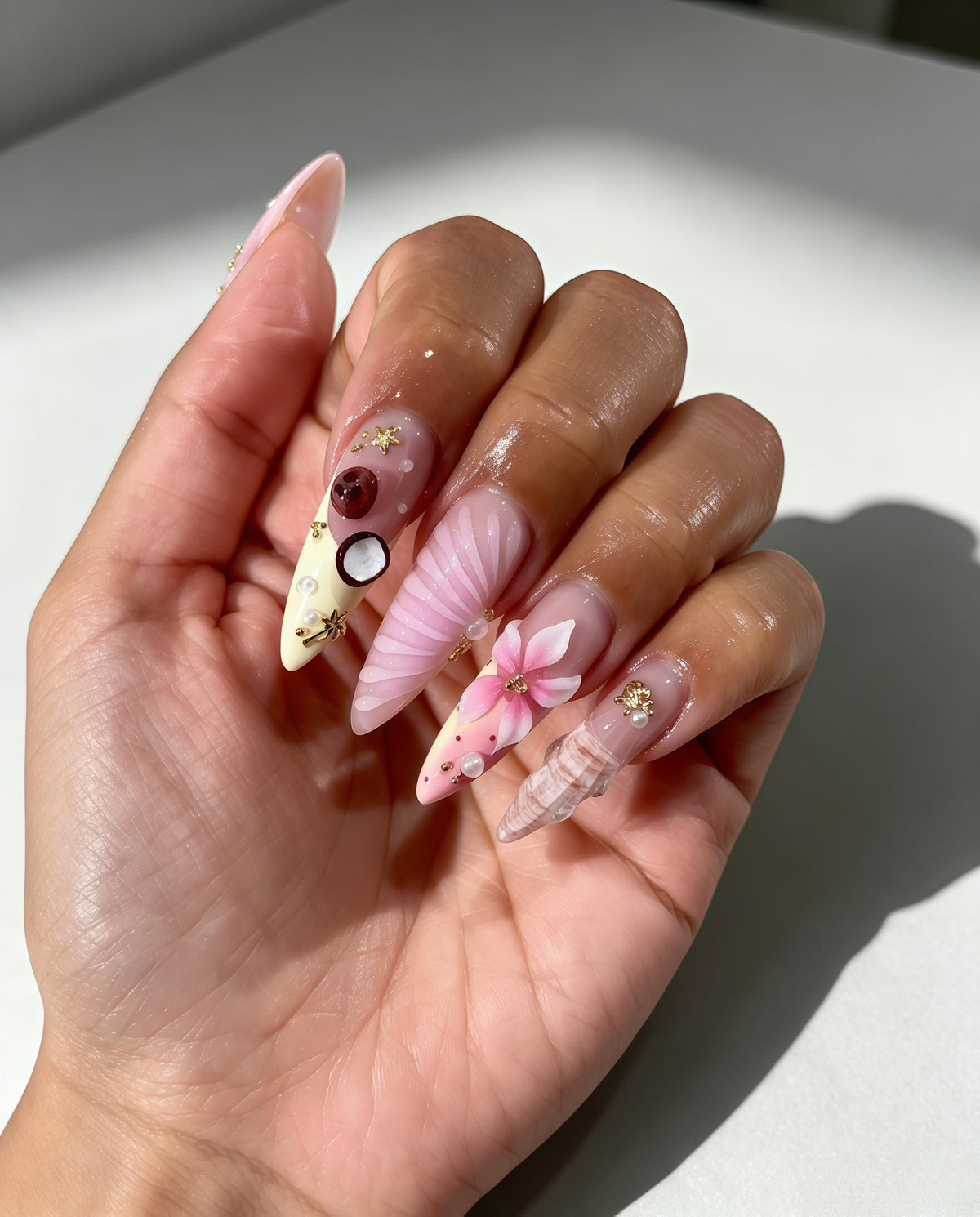 Romantic Ocean-Inspired Pink Nails with 3D Flowers, Shell Details and Gold Charms