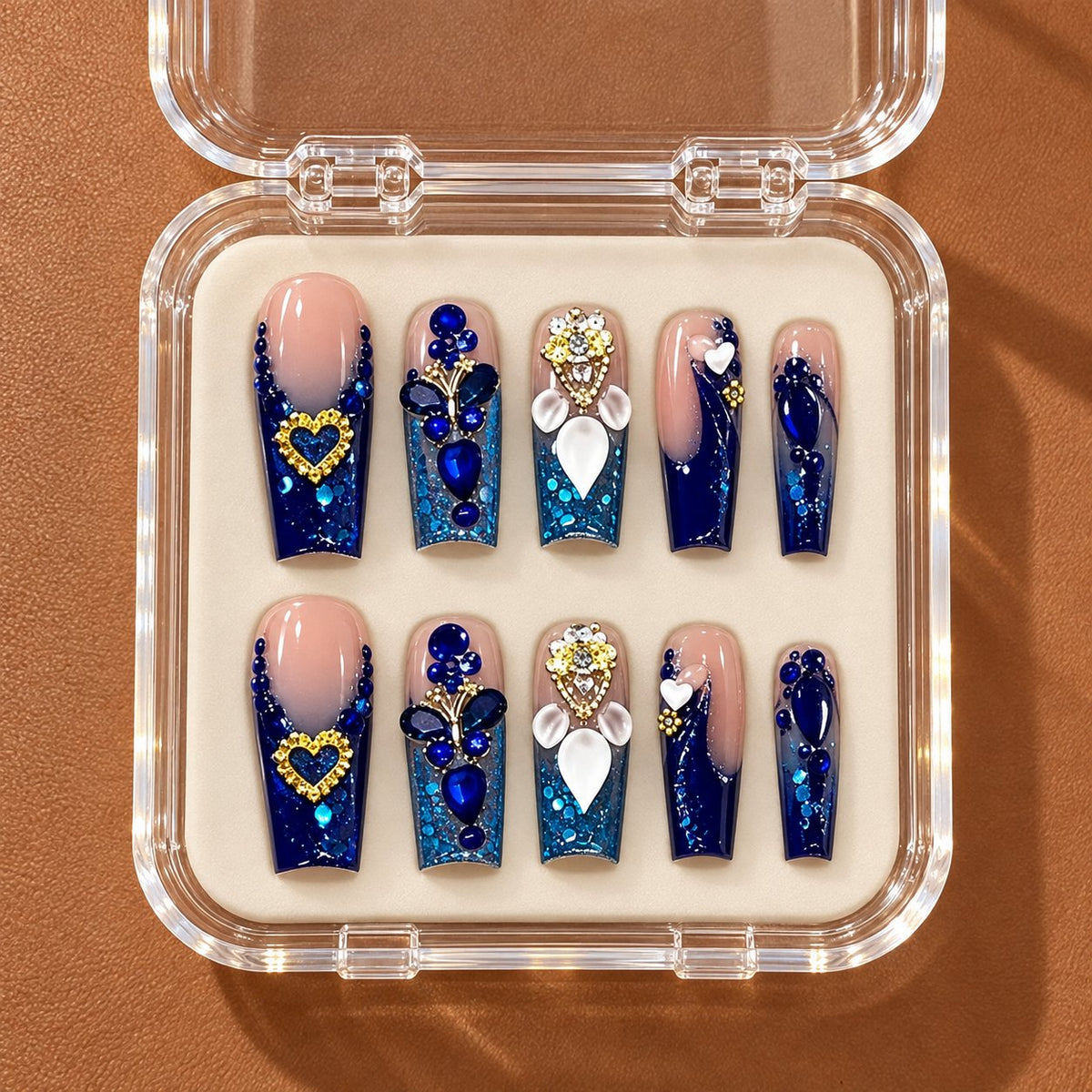 Royal Blue 3D Heart Rhinestone Press-On Nail Set in clear acrylic storage box