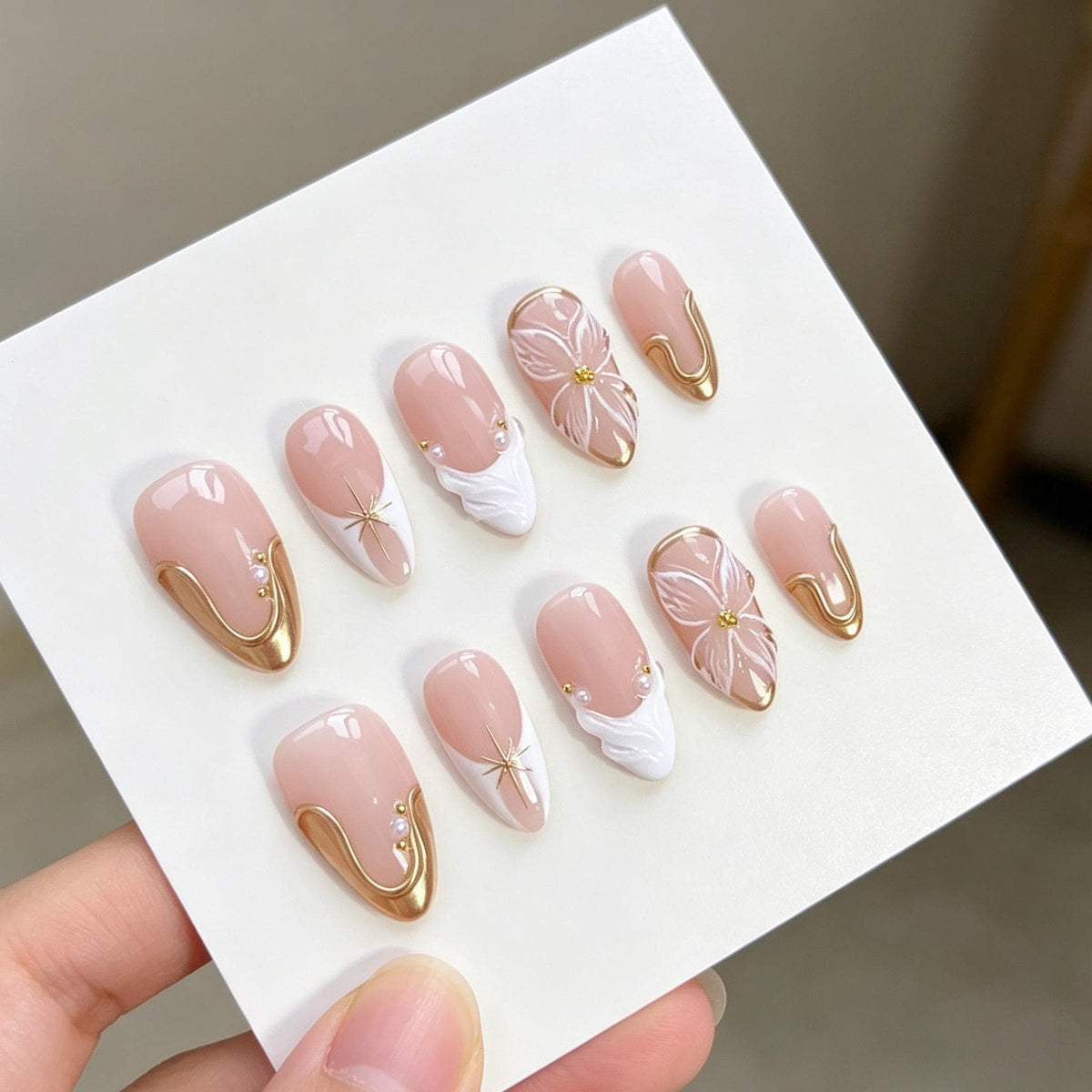 Sheer Blush Pink Bridal Nails With White Flowers, Gold Swirls and Raised Details