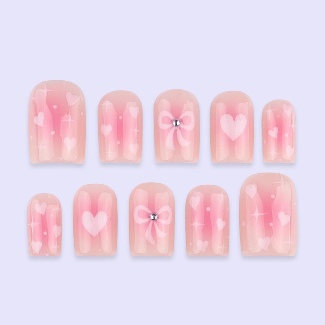 Sheer Blush Pink Valentine Nails with Hearts, Rhinestone Bows & Sparkle
