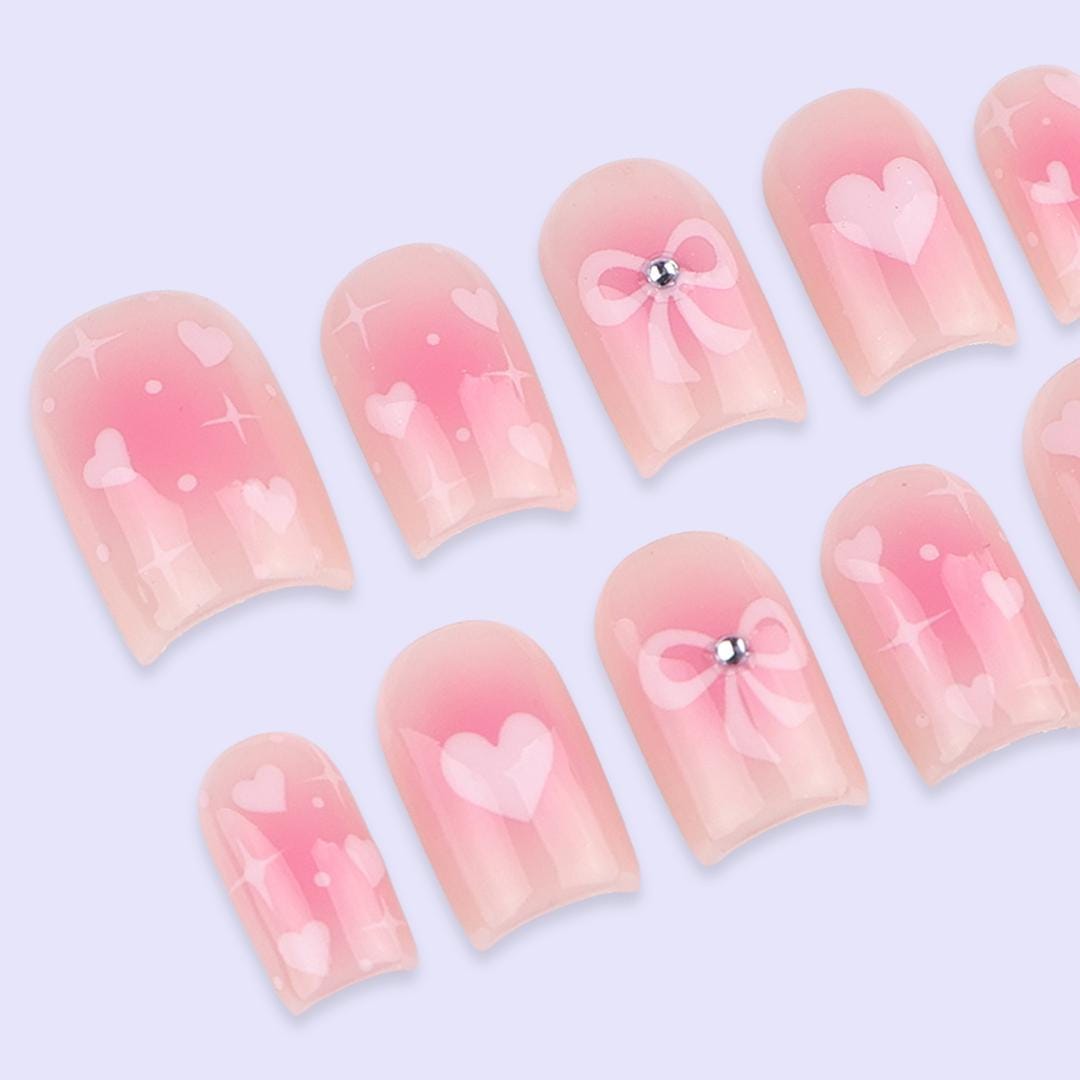 Sheer Blush Pink Valentine Nails with Hearts, Rhinestone Bows & Sparkle