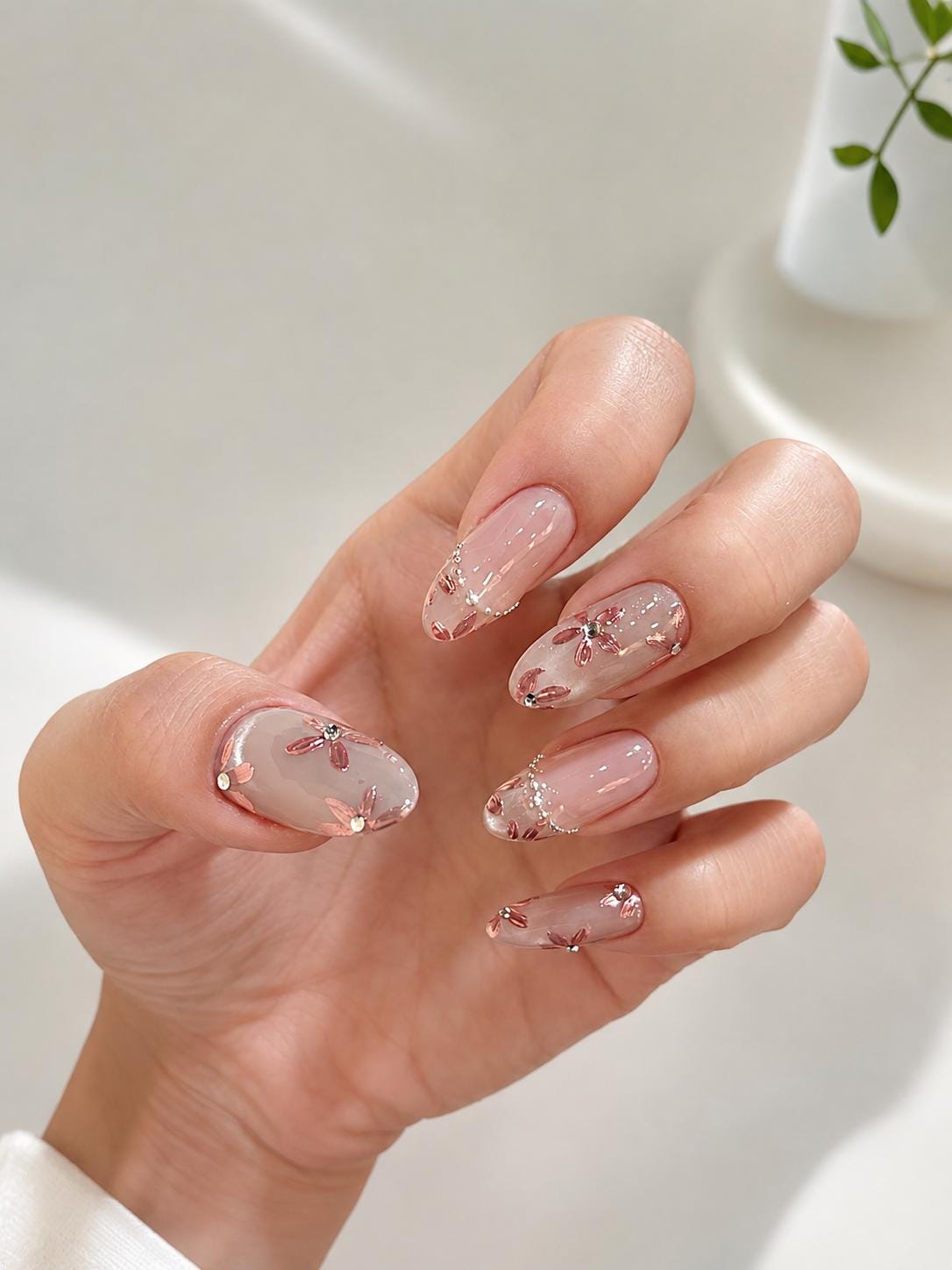 Sheer Nude Pink Floral French Tip Nail Set With Gold and Iridescent Accents