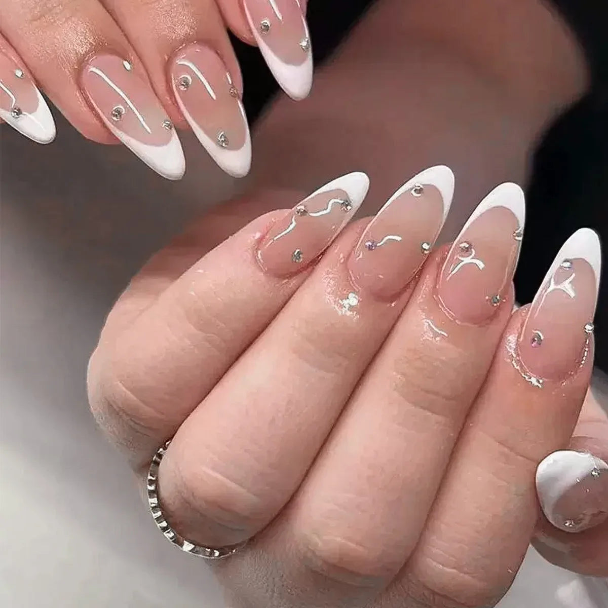 Sheer Nude Pink French Tip Nail Set With Silver Waves and Rhinestones