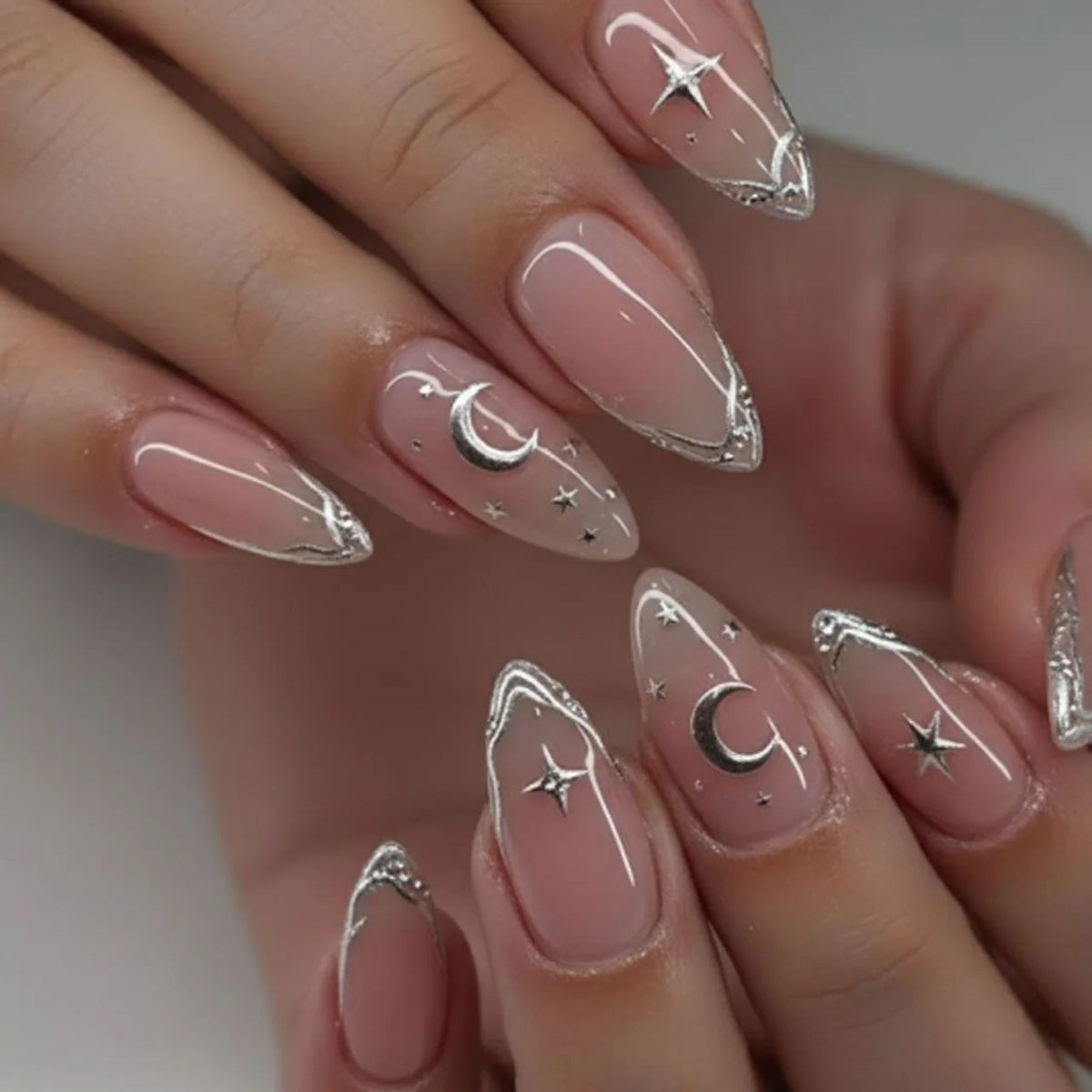 Sheer Nude Pink French Tip Nails with Silver Moons and Stars