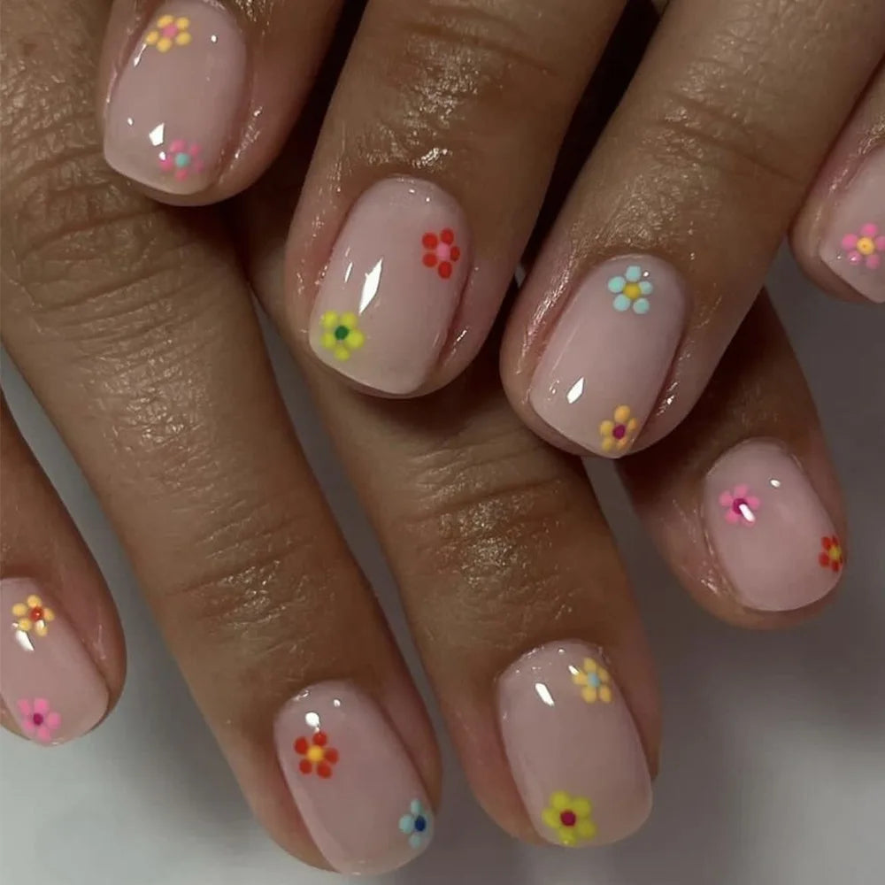 Sheer Nude Pink Nails With Bright Flower Details