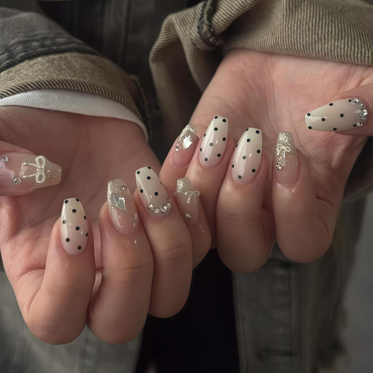 Sheer Nude Pink Polka Dot Nails with Silver Bows and Rhinestones