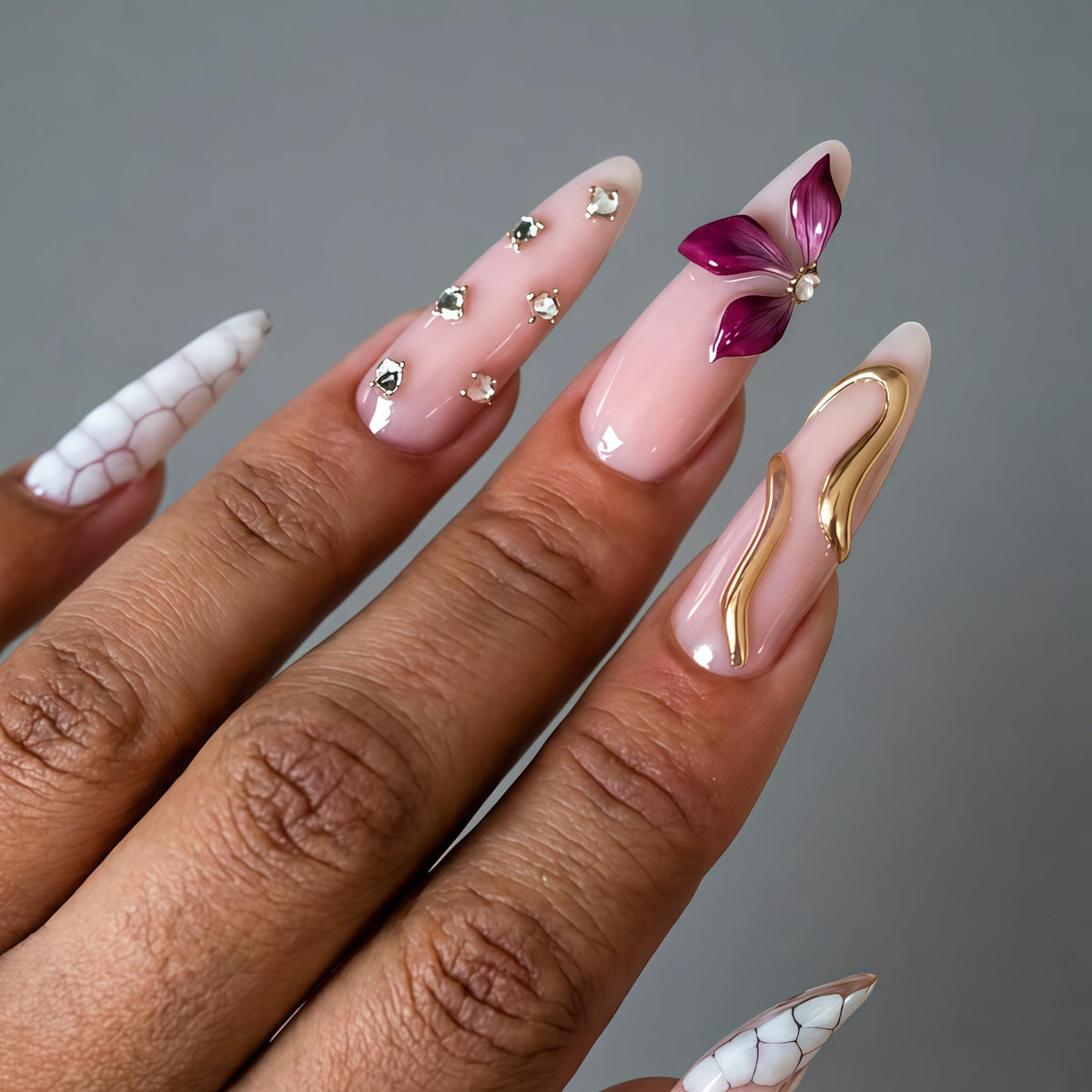 Sheer Pink and White Marble Nails with 3D Butterfly and Gold Accents