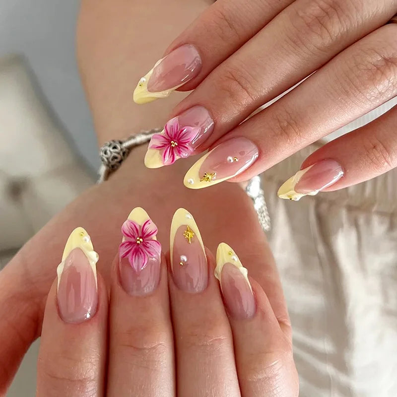 Sheer Pink and Yellow French Tip Nails with 3D Flowers and Pearl Details