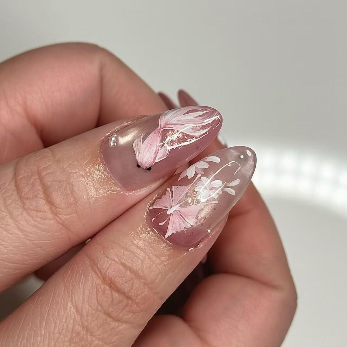 Sheer Pink Floral Press-On Nails with White Flowers and Silver Accents