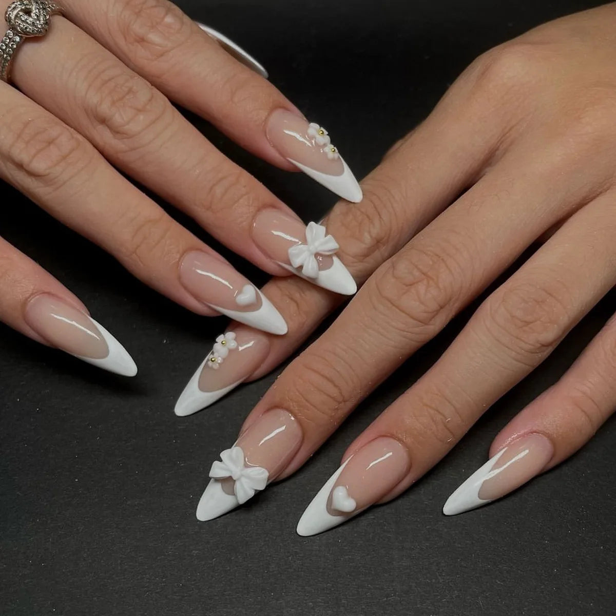 Sheer Pink French Tip Nails With 3D White Bows and Pearl Accents