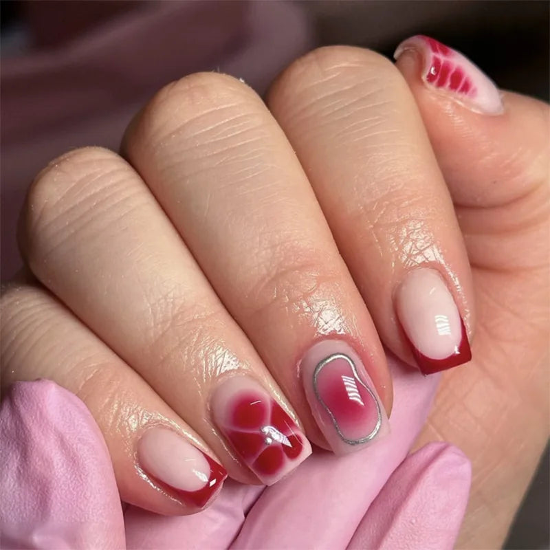 Sheer Pink French Tip Nails with Deep Red Accents