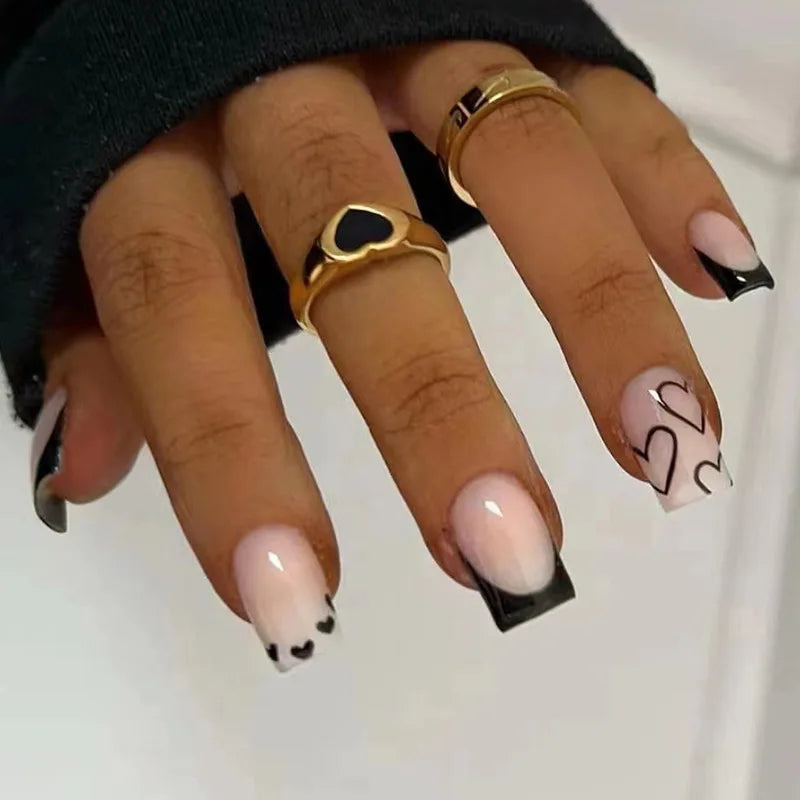 Sheer Pink French Tip Press On Nails with Black Hearts