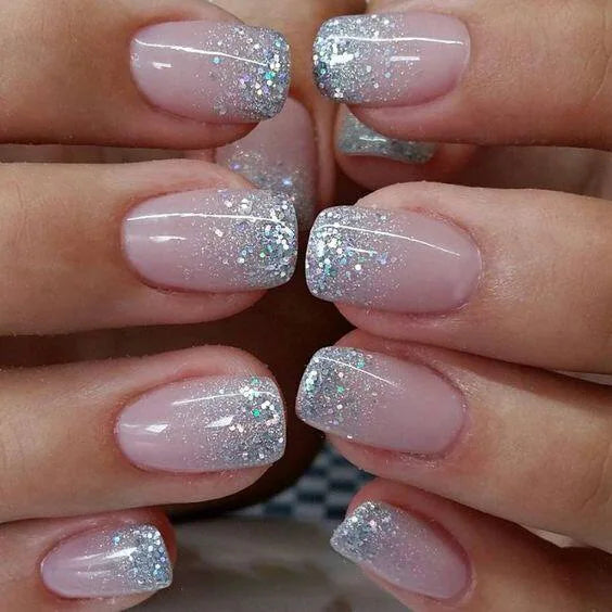 Sheer Pink Nude Nails With Silver Glitter French Ombre