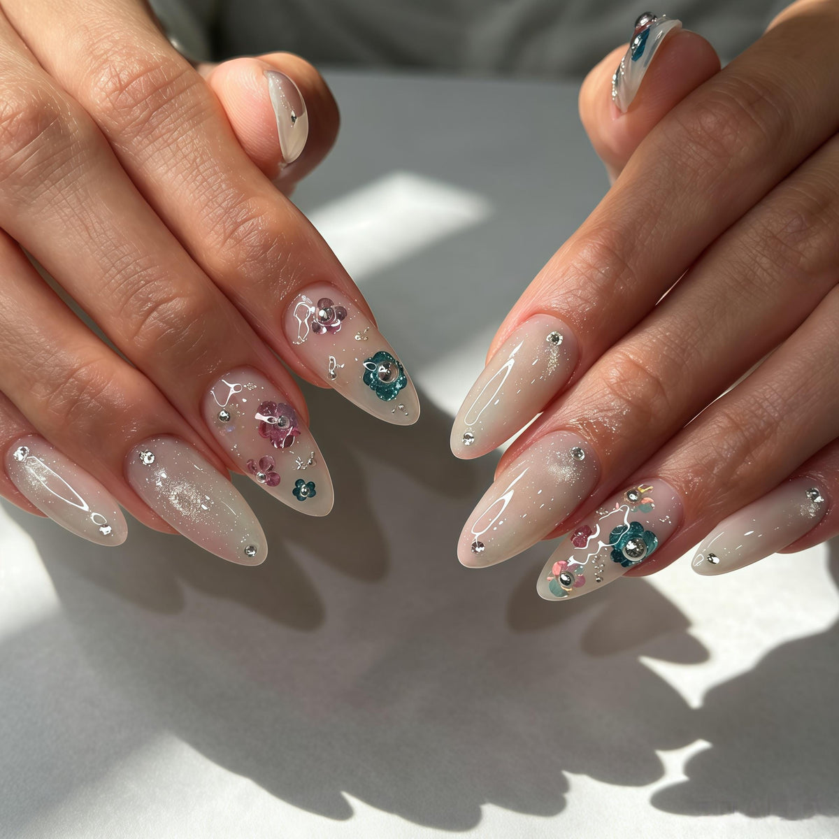 Shimmery Taupe Gray Nails with Teal and Pink Gem Floral Accents