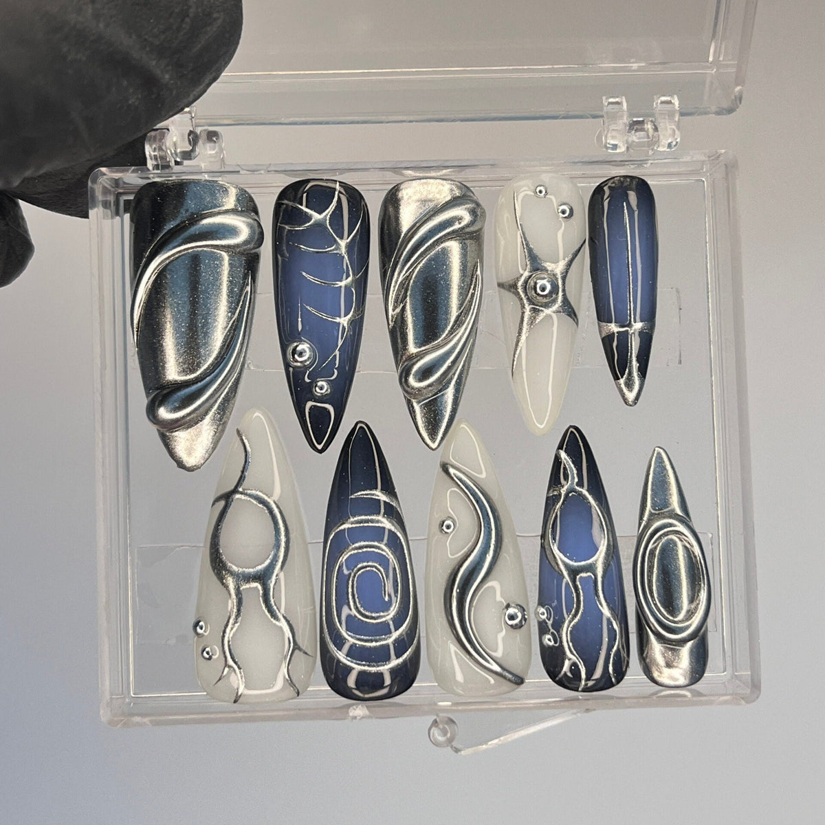 Silver, Navy, and Ivory Y2K Chrome Swirl Nail Set With Metallic Accents