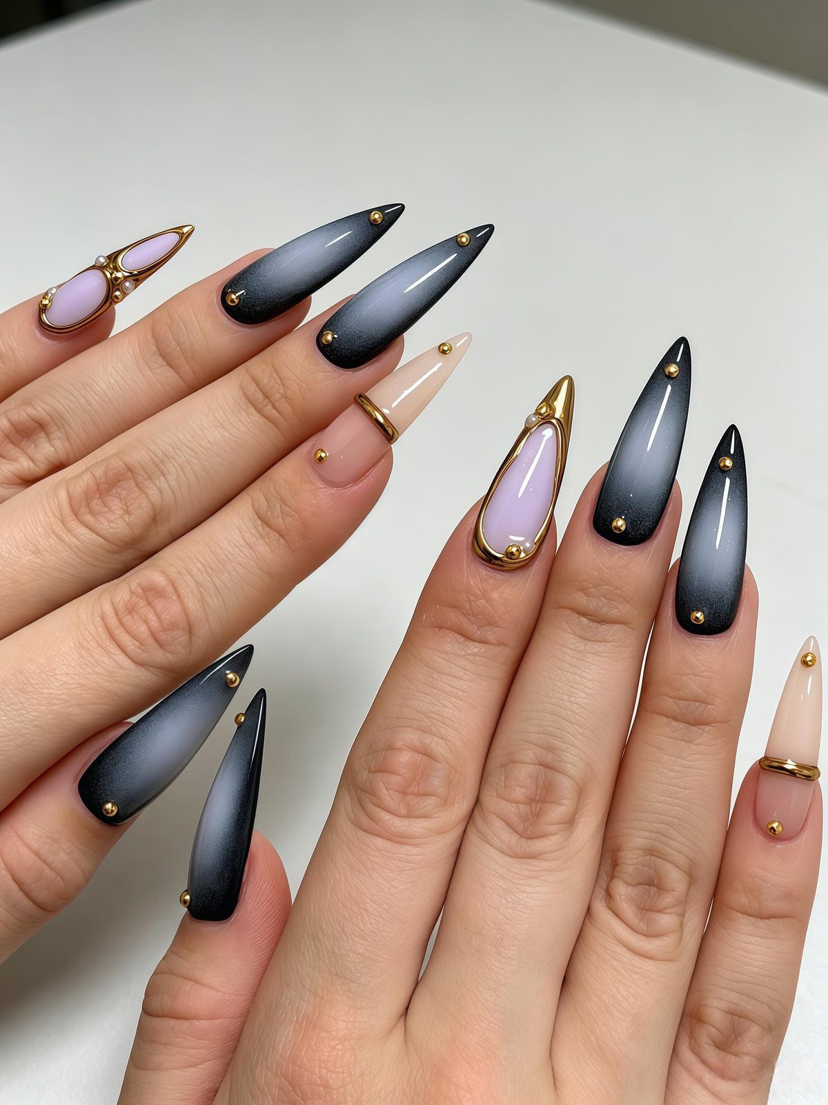 Smoky Charcoal Gradient Nails with Lavender Accents and Gold Studs