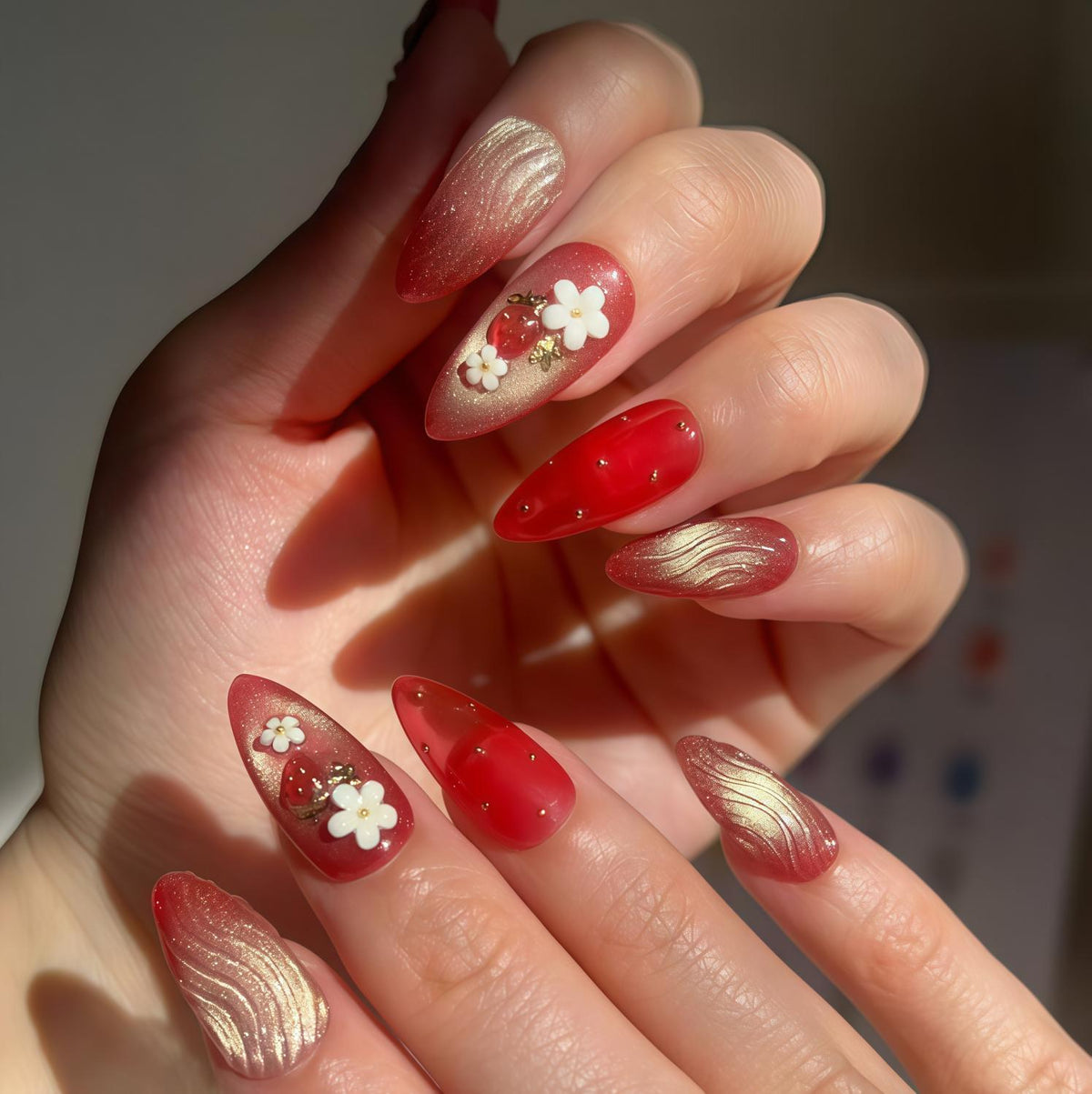 Strawberry Bloom Press On Nails with Red, Nude, White Flowers, and Gold Swirls
