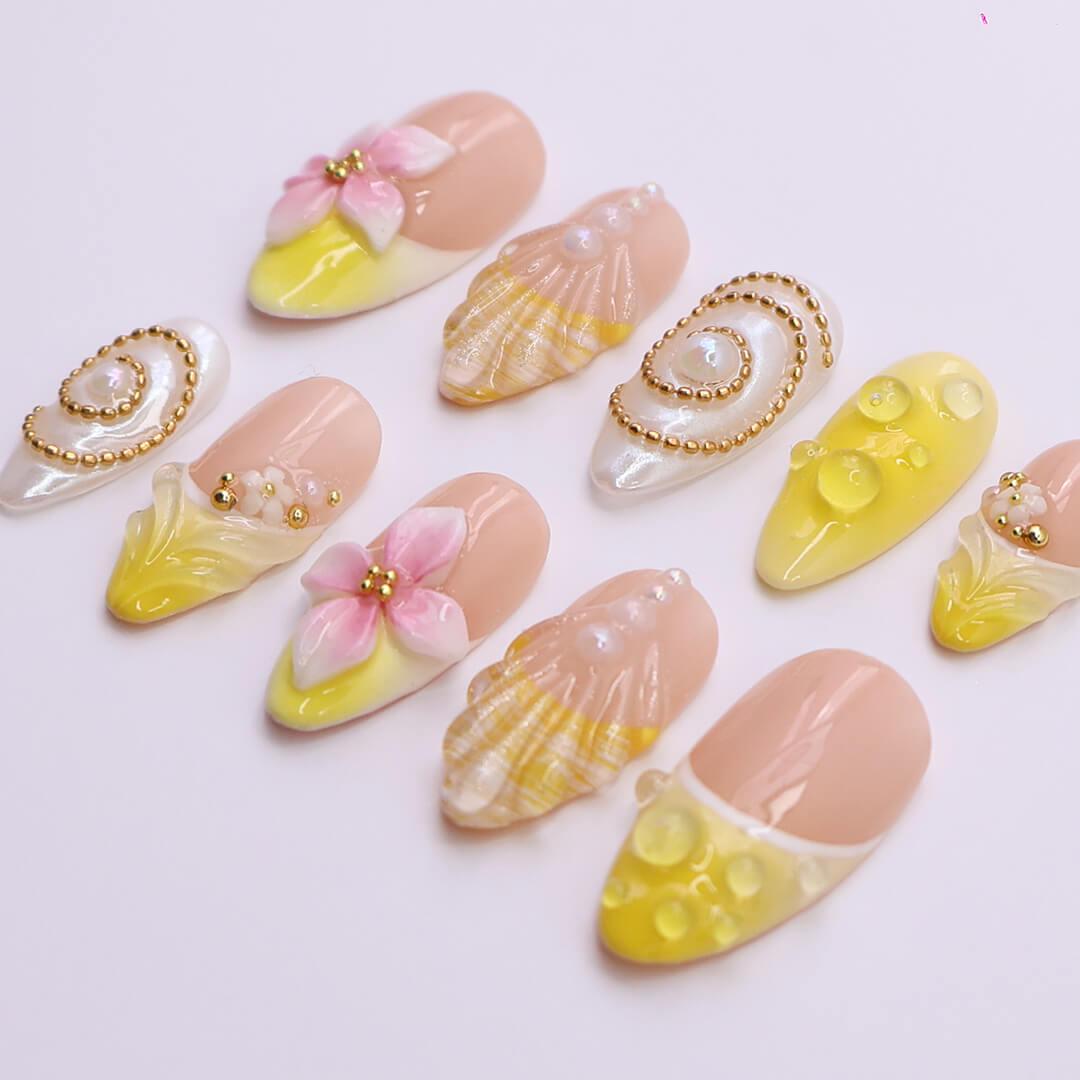 Summer Blush Pink and Yellow Seashell Flower Nails with Gold and Pearl Details