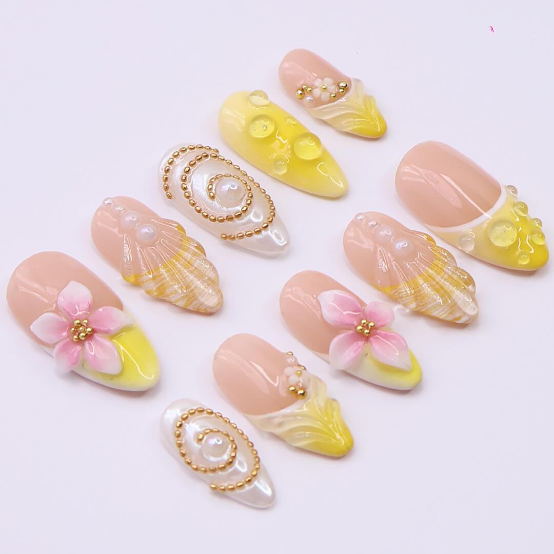 Summer Blush Pink and Yellow Seashell Flower Nails with Gold and Pearl Details