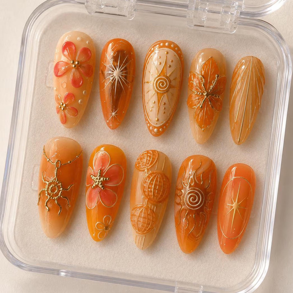 Summer Orange and Amber Celestial Nails with Gold Sunbursts and Raised Flowers