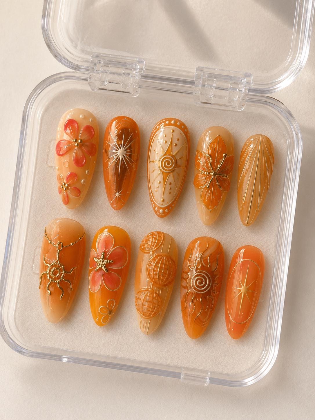 Summer Orange and Amber Celestial Nails with Gold Sunbursts and Raised Flowers
