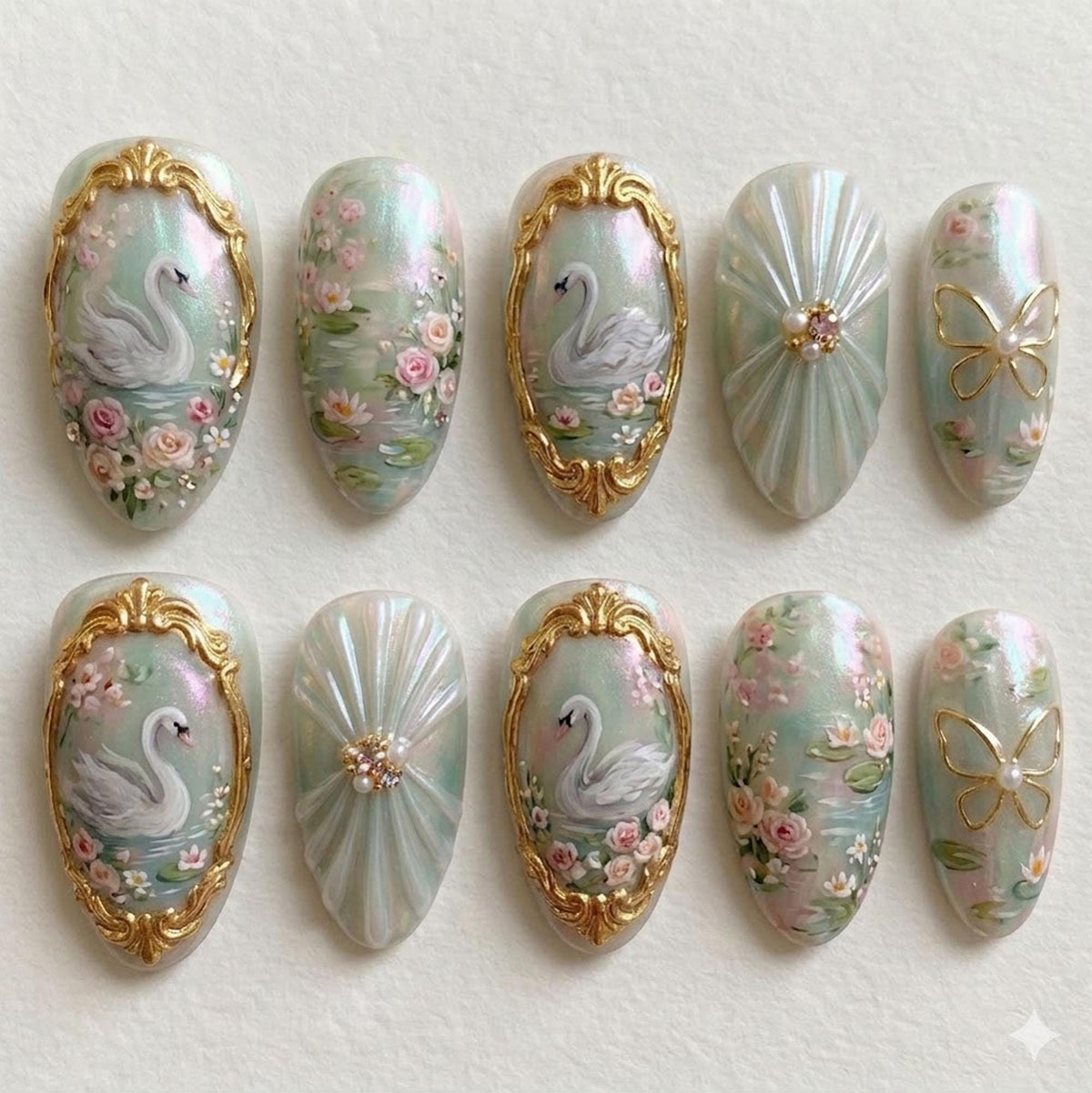 Swan Lake Pearl Chrome Nails with 3D Florals and Ornate Gold Frames