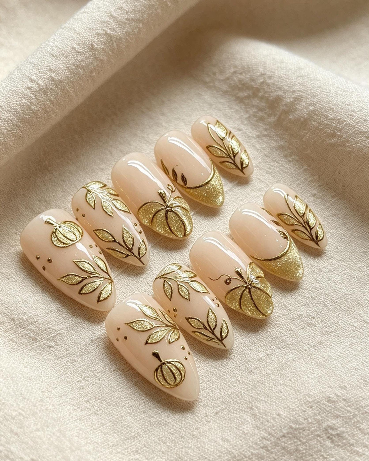 Thanksgiving Autumn Pumpkin Nails with Gold Glitter French Tips and Leaf Details