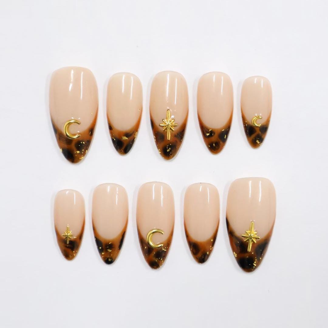 Tortoiseshell French Tip Press On Nails with Gold Moon and Starburst Charms