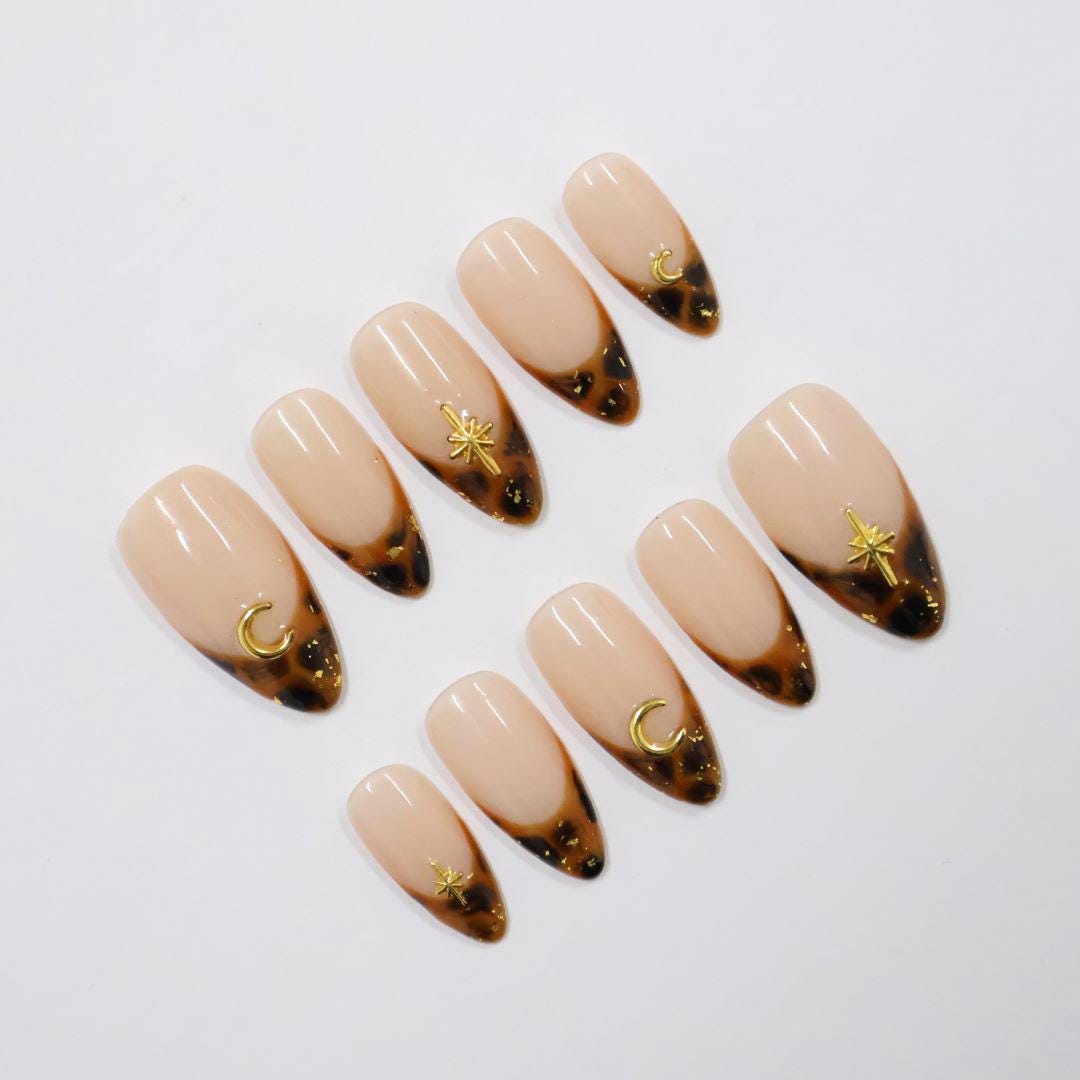 Tortoiseshell French Tip Press On Nails with Gold Moon and Starburst Charms
