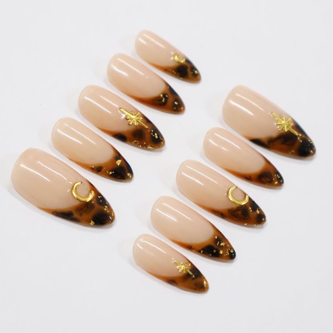 Tortoiseshell French Tip Press On Nails with Gold Moon and Starburst Charms