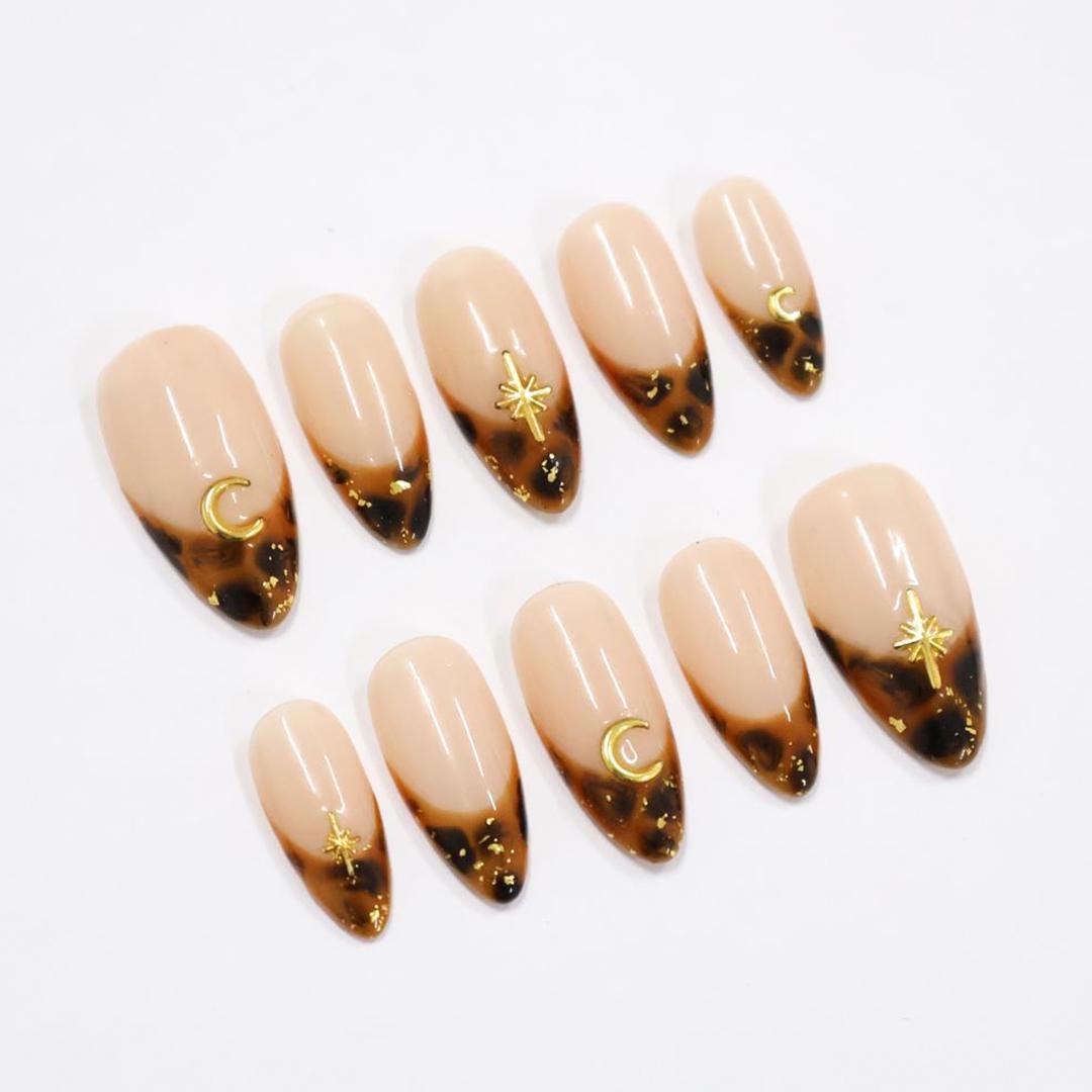 Tortoiseshell French Tip Press On Nails with Gold Moon and Starburst Charms