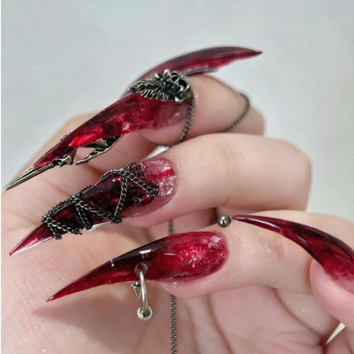 Translucent Burgundy Gothic Nails With Silver Chains and Raised Charms