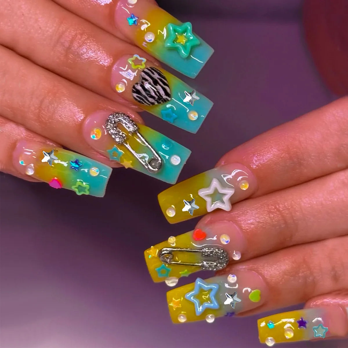 Translucent Rainbow Y2K Nails with Star Accents, Gems and Safety-Pin Charms