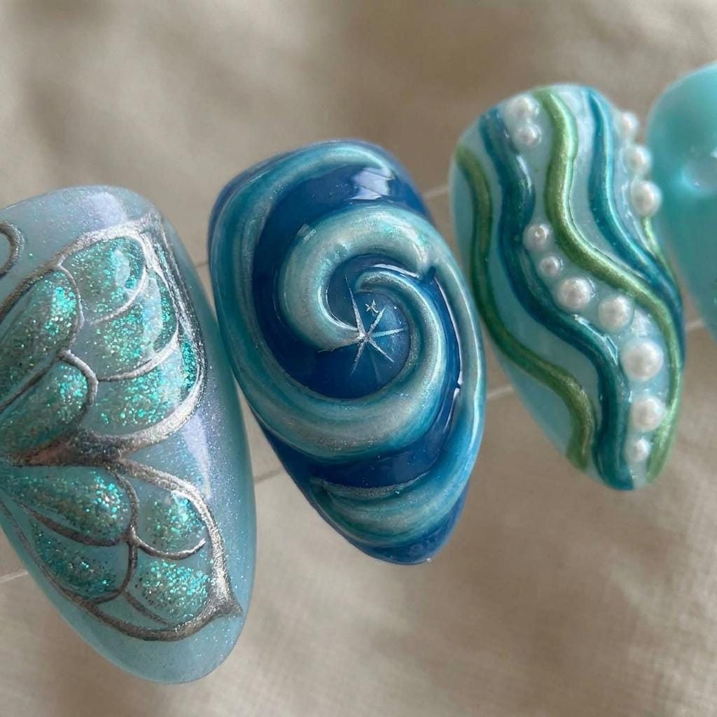 Turquoise Ocean Wave Press-On Nails With Sculpted Shell Details and Blue Flower