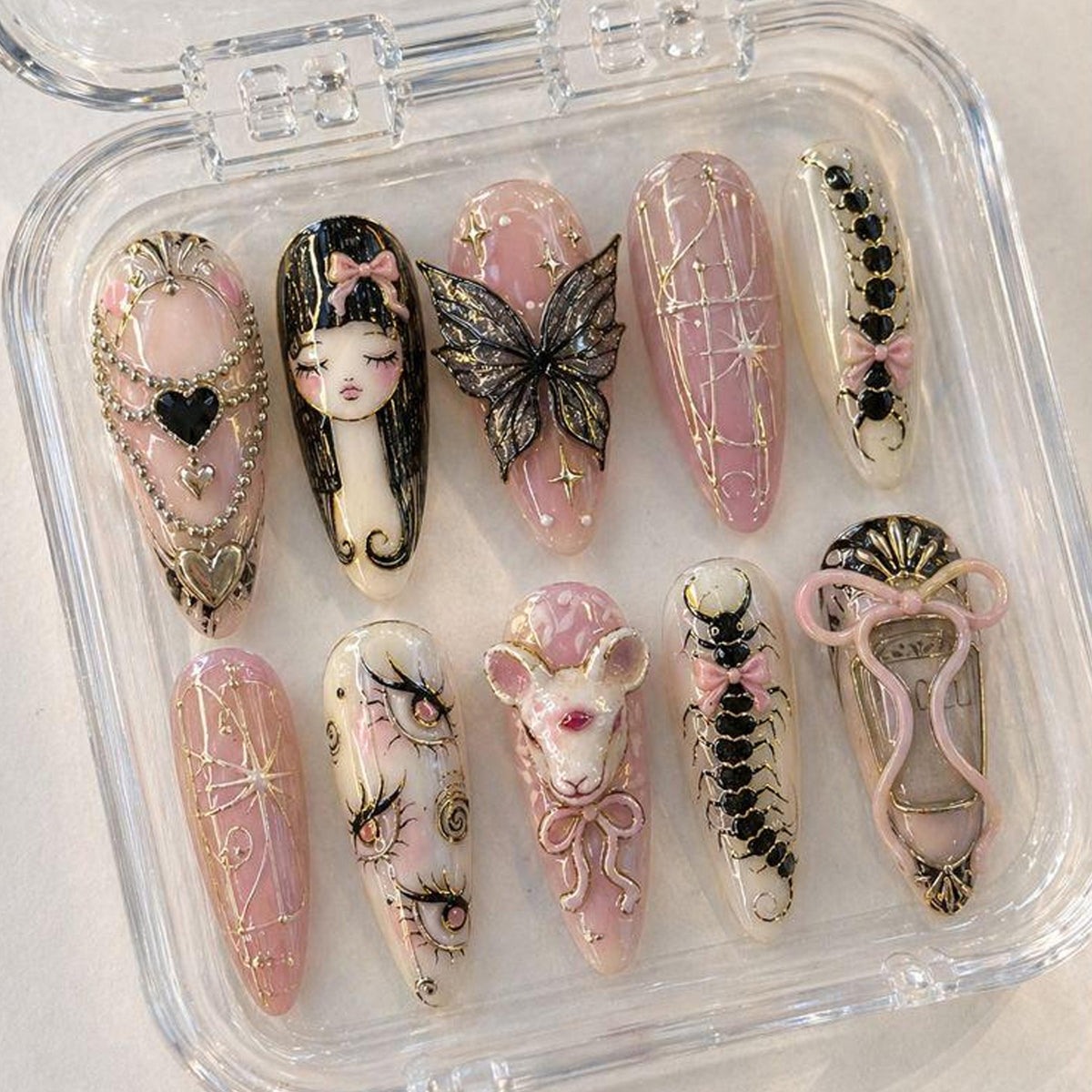 Whimsical Gothic Fantasy Press-On Nails With Pink, Gold, Portraits and Sculptural Details