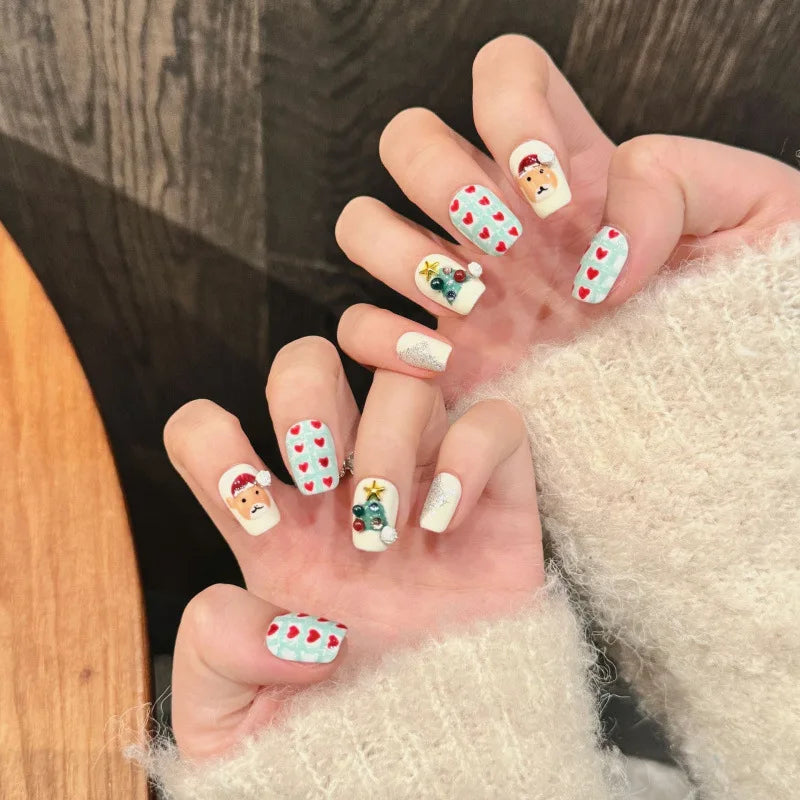 White Christmas Press On Nails With Animal Faces, Hearts and Tree Designs