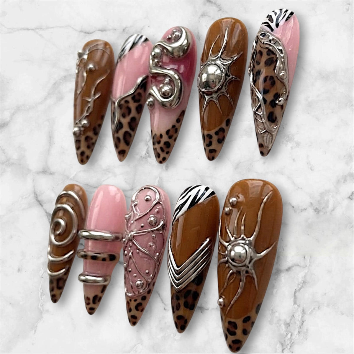 Y2K Cyberpunk Brown Leopard and Zebra Print Nails with Pink and Silver Sculptural Details