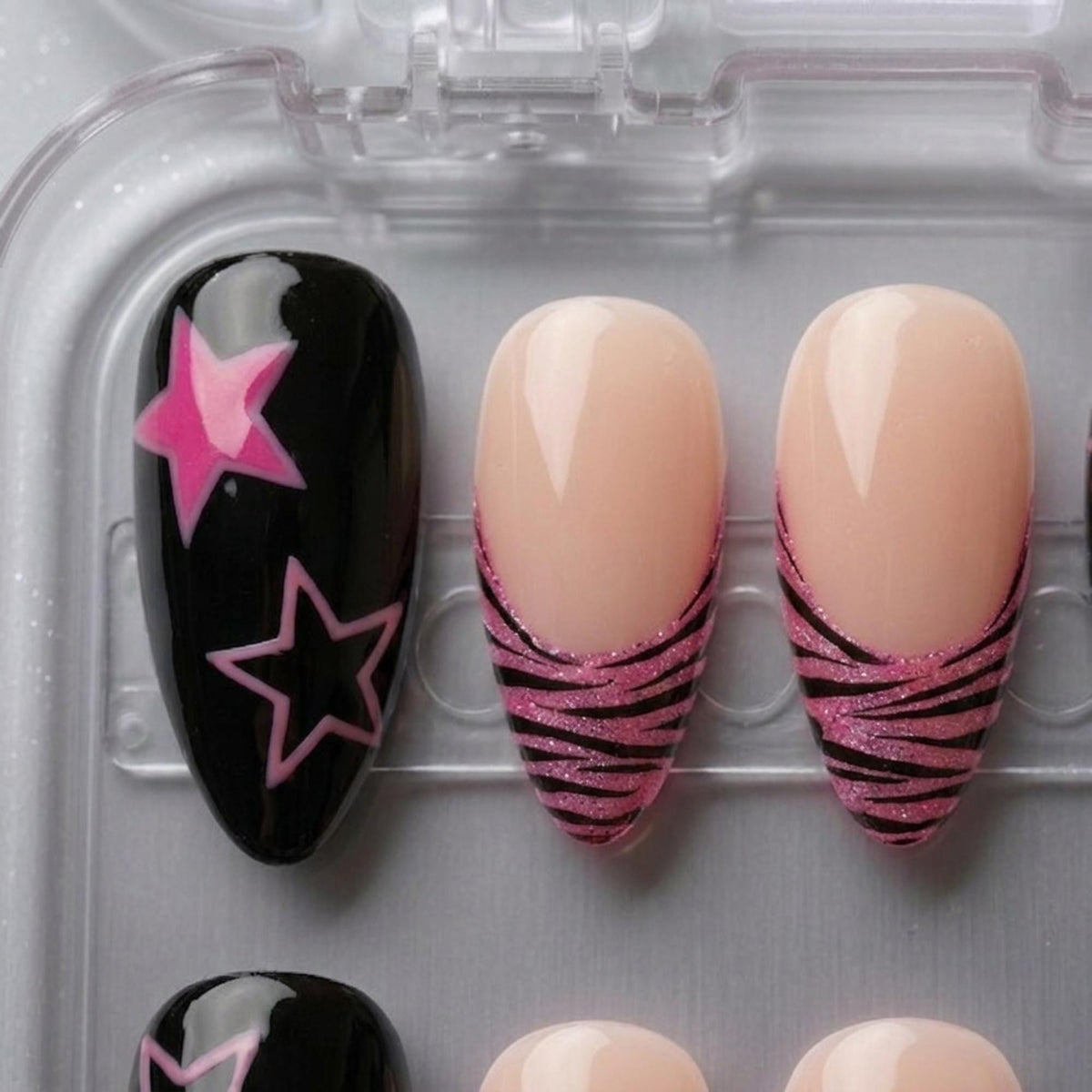 Y2K Pink and Black Star Nails With Zebra French Tips and Glitter Leopard Print