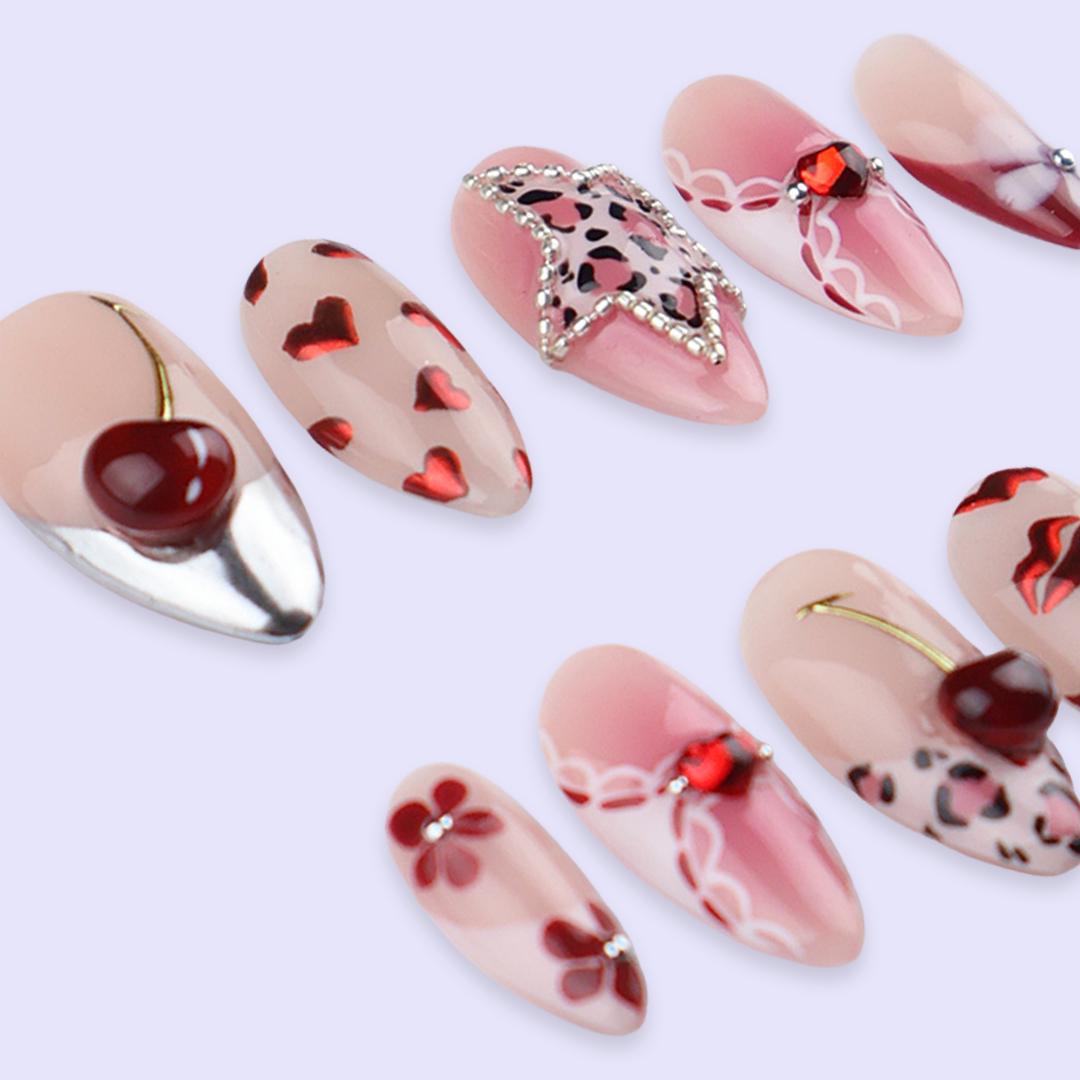 Y2K Valentine Nails With Leopard Spots, Rhinestone Star, Cherries and Chrome