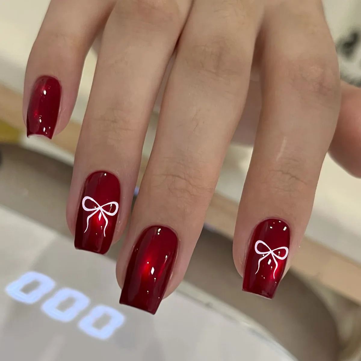 Medium fake nails for women gilrs cat eyes new year red with white heart bowknot design Square almond shape press on nails art
