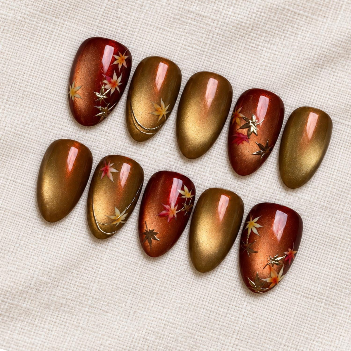 Amber Gold Cat Eye Nails With Painted Autumn Leaves