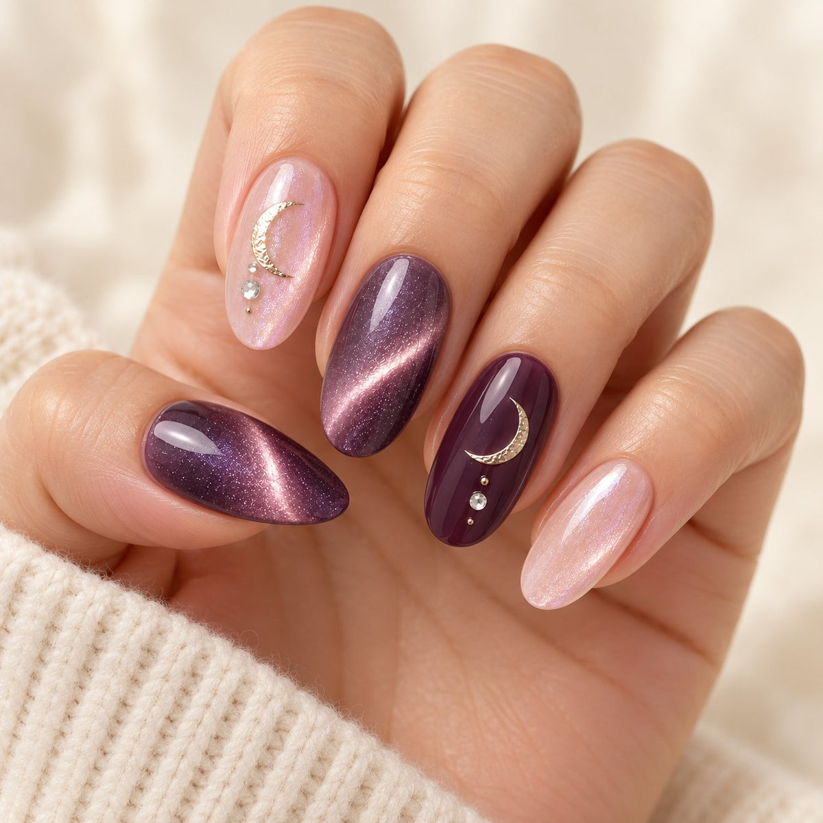 Amethyst Moon Celestial Nails With Gold Crescents and Crystal Accents worn on hand