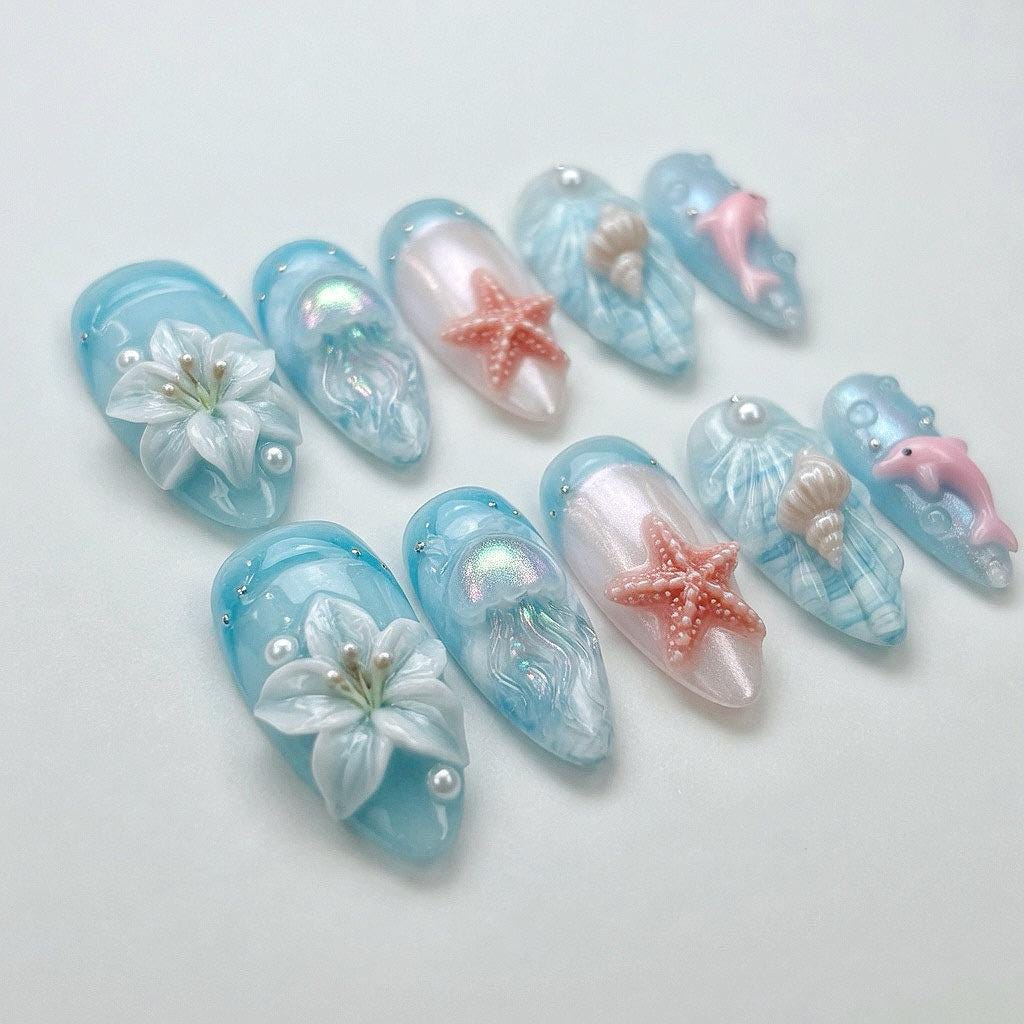 Aqua Ocean Press On Nails With 3D Dolphins, Starfish, Shells, and Flowers