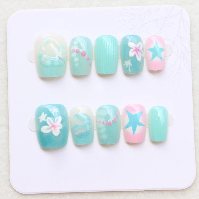 Aqua Turquoise Starfish and Flower Nails With Pink Stars and Ocean Details