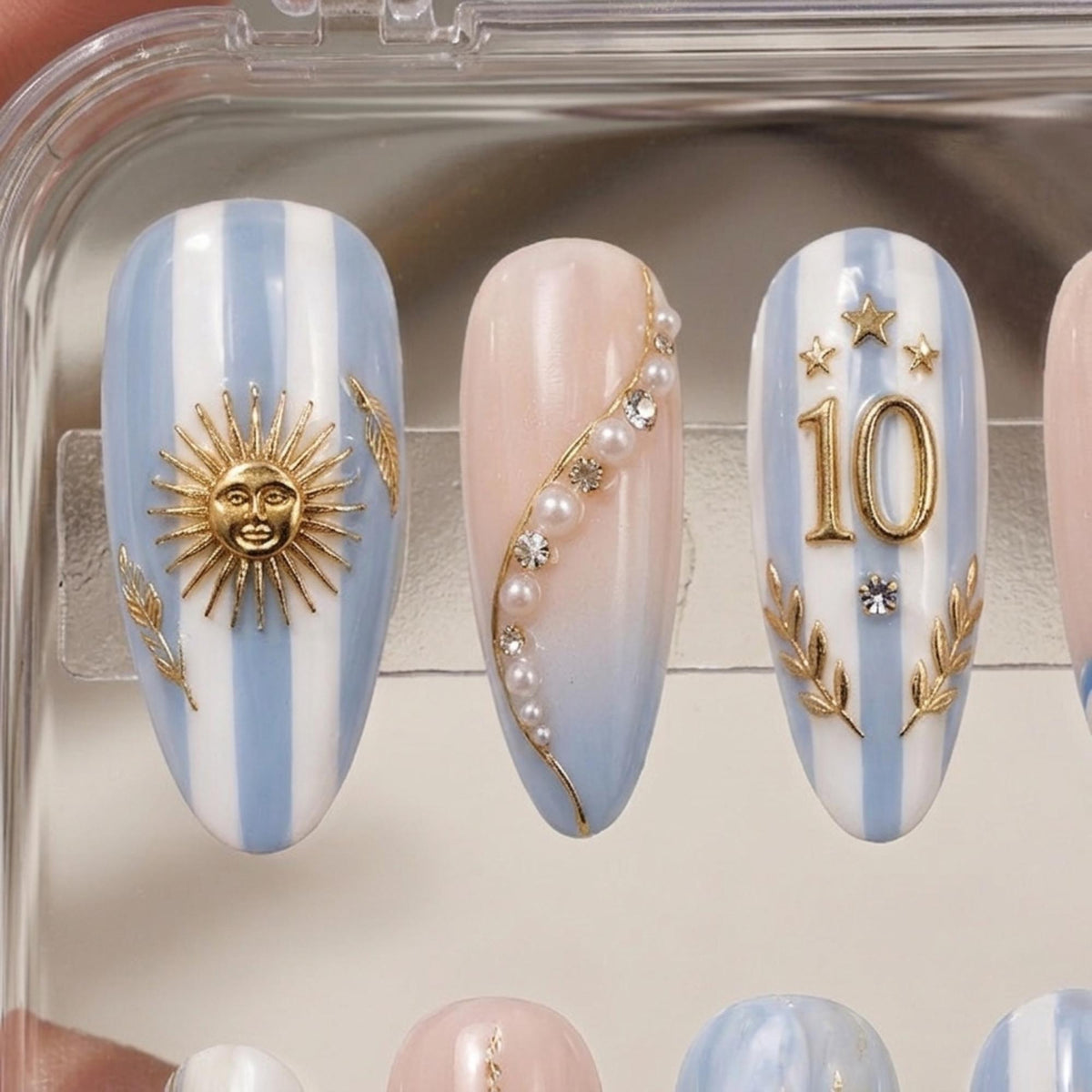 Argentina Blue and White Striped Nails with Gold Sun, Number 10, Pearls and Rhinestones