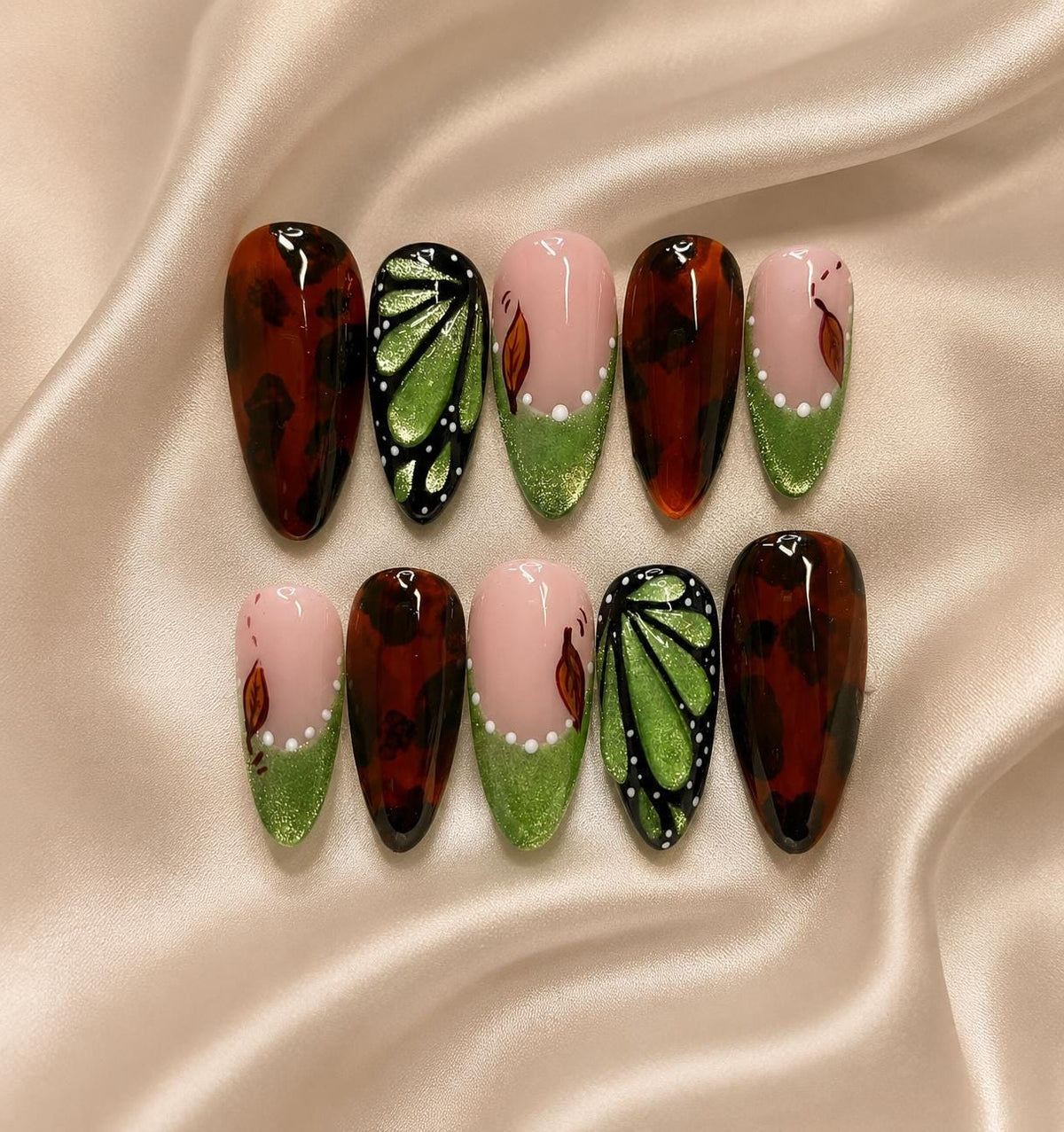 Autumn Tortoiseshell Butterfly Nails With Green Glitter French Tips